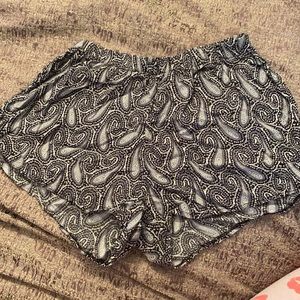 Black, white, and gray pattern shorts.